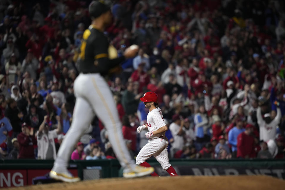 Philadelphia Phillies' Garrett Stubbs, right, rounds the bases after hitting a three-run home run against Pittsburgh Pirates pitcher Johan Oviedo during the fourth inning of a baseball game, Wednesday, Sept. 27, 2023, in Philadelphia. (AP Photo/Matt Slocum)