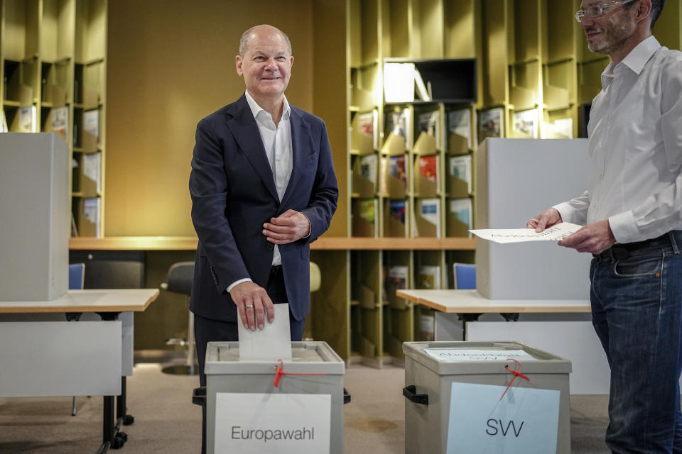 German Chancellor Olaf Scholz casts his ballot for the European Parliament elections, in Potsdam, Germany, Sunday, June 9, 2024. Tens of millions across the European Union were voting in EU parliamentary elections on Sunday in a massive exercise of democracy that is expected to shift the bloc to the right and redirect its future. (Kay Nietfeld/dpa via AP)