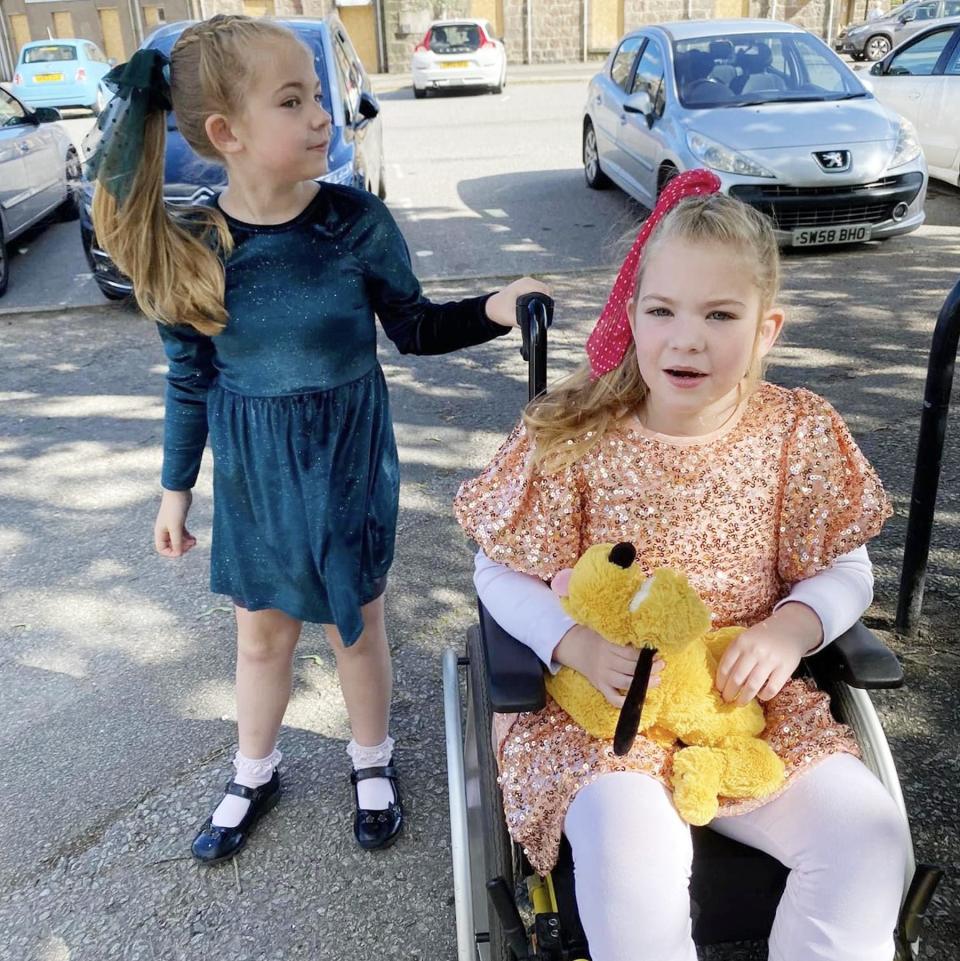 Lily Nicholson with her twin sister