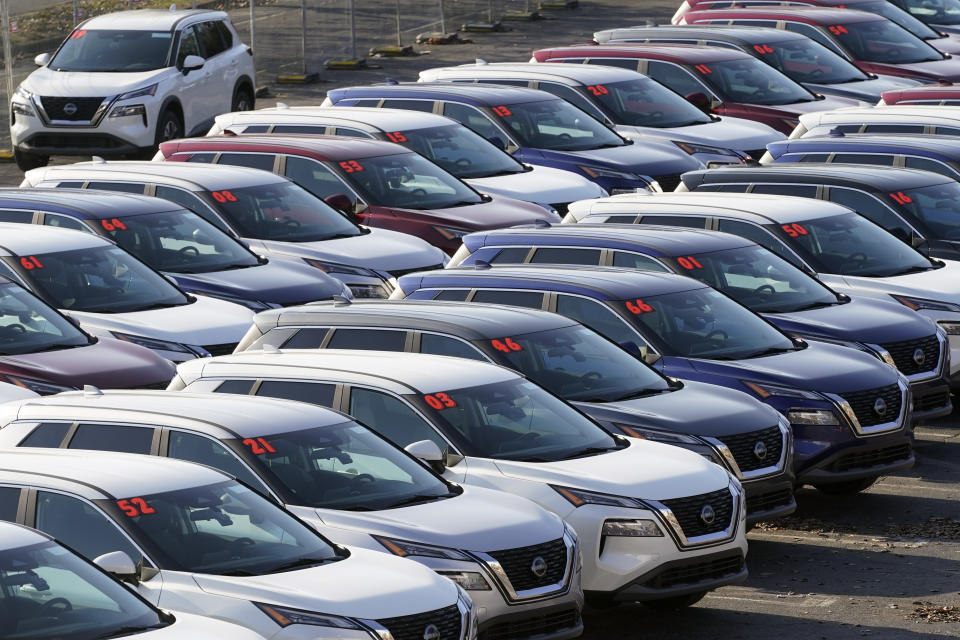 Specially equipped cars sit in a parking lot Thursday, Nov. 17, 2022, in Nashville, Tenn. In a study, the cars' cruise control was modified to react to the overall flow of traffic using artificial intelligence. The aim is to influence a phenomenon called a phantom traffic jam — the start-and-stop congestion on crowded roads that has no obvious cause. (AP Photo/Mark Humphrey)