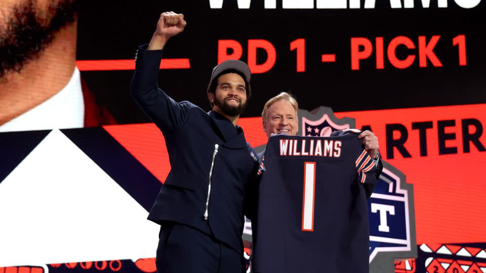 Caleb Williams poses with NFL Commissioner Roger Goodell after being selected by the Chicago Bears. - Gregory Shamus/Getty Images