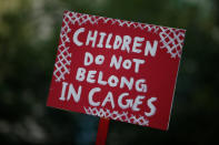 <p>A sign is raised as people protest against the Trump administration’s policy of separating immigrant families suspected of illegal entry, in New York, N.Y., June 19, 2018. (Photo: Brendan McDermid/Reuters) </p>