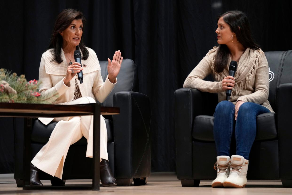 Republican presidential candidate former United Nations Ambassador Nikki Haley, left, speaks as her daughter Rena, right, looks on during U.S. Rep. Randy Feenstra's, R-Iowa, Faith and Family with the Feenstras event, Saturday, Dec. 9, 2023, in Sioux Center, Iowa.