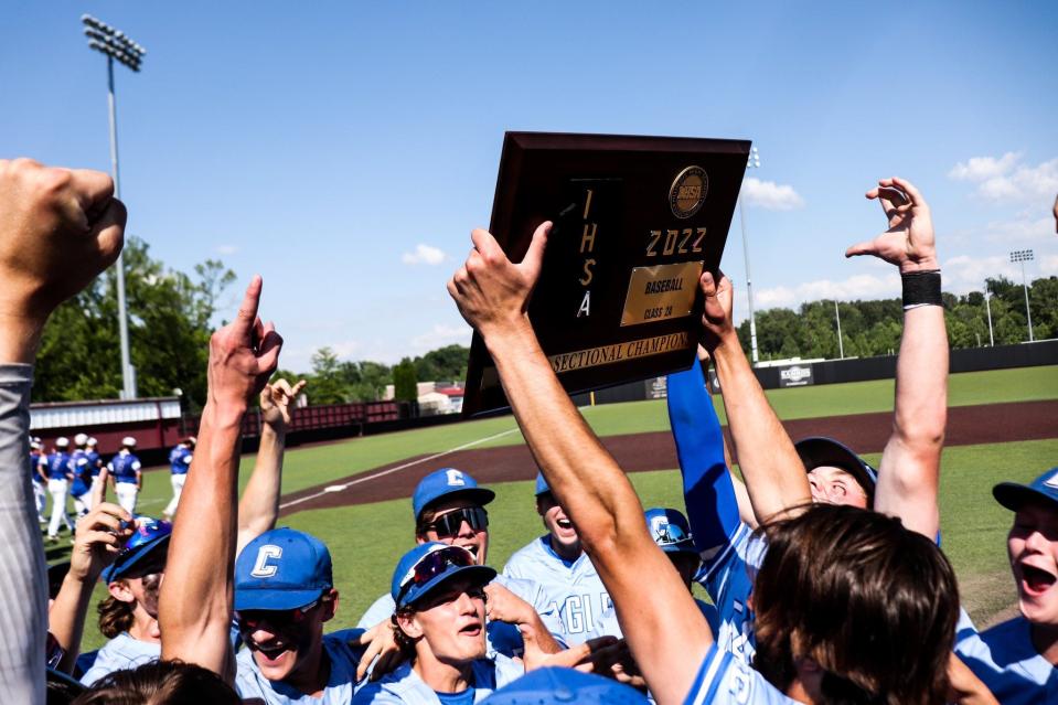 The Columbia baseball team celebrate its Class 2A supersectional victory Monday in Carbondale.