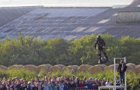 Franky Zapata, a 40-year-old inventor, takes to the air in Sangatte, Northern France, at the start of his attempt to cross the channel from France to England, aboard his flyboard, Sunday Aug. 4, 2019. Zapata will try again Sunday, to traverse the English Channel on a flying board after his first attempt failed when he crashed into a refueling boat 20 kilometers (12 miles) into the trip. (AP Photo/Michel Spingler)