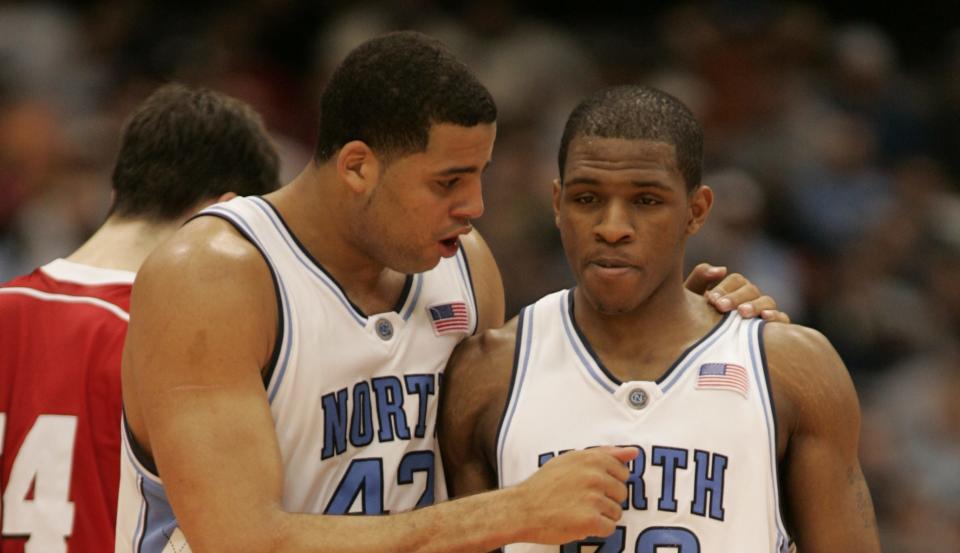 3/27/2005 — Syracuse, NY, U.S.A — NCAA East Regional Final — University of North Carolina Tar Heels vs University of Wisconsin Badgers — UNC’s #42 Sean May and #32 Rashad McCants as the clock wound down Photo by Robert Deutsch, USA TODAY staff (Via MerlinFTP Drop)