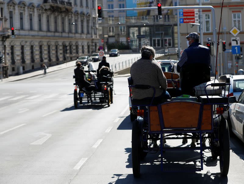 Fiaker horse carriages deliver food in Vienna