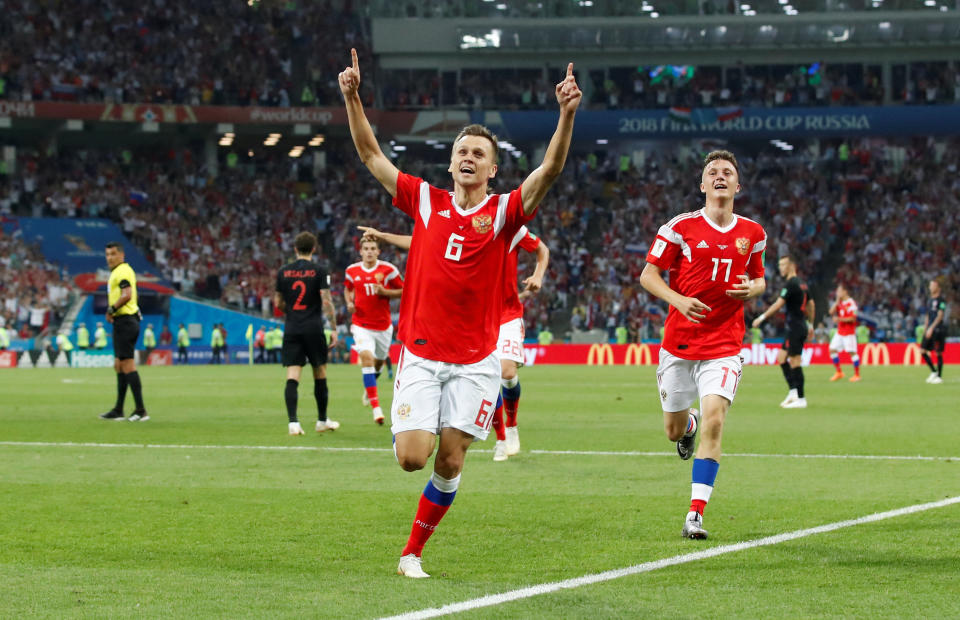 <p>Cheryshev celebrates putting Russia into the lead </p>