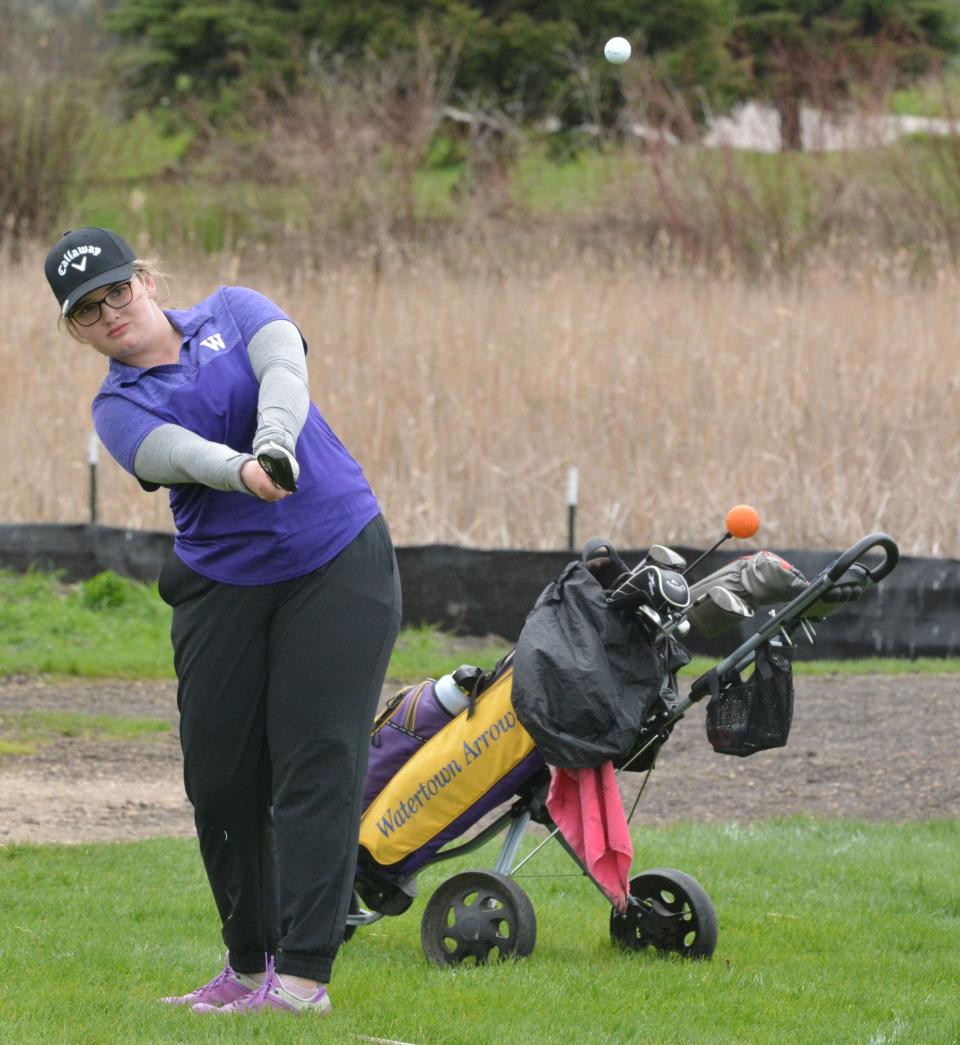 Watertown's Hannah Loehrer chips to No. 5 Red on Tuesday during the Watertown Girls Golf Invitational at Cattail Crossing Golf Course.