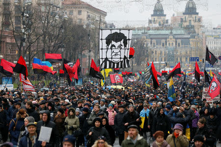 Supporters of former Georgian President Mikheil Saakashvili march through the city centre during a rally in Kiev, Ukraine December 10, 2017. REUTERS/Gleb Garanich