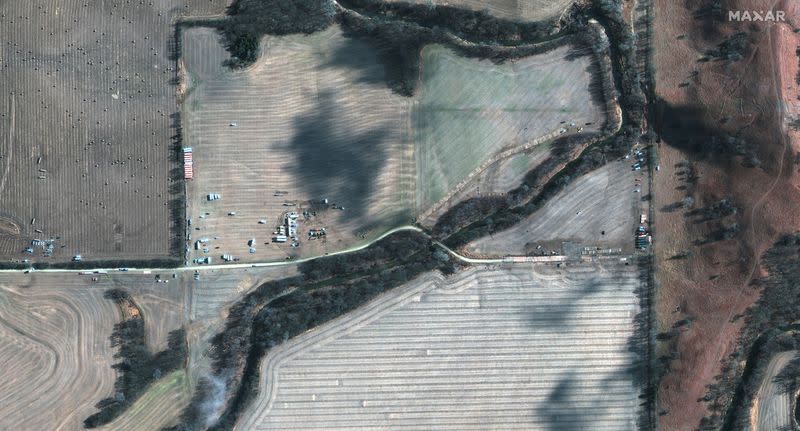 A satellite image shows emergency crews working to clean up crude oil pipeline spill along Mill Creek, in Kansas