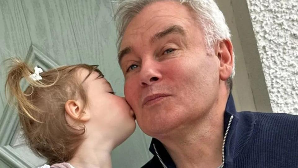 Eamonn Holmes getting a kiss from his granddaughter