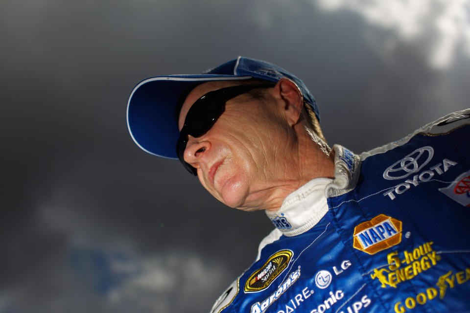 DAYTONA BEACH, FL - FEBRUARY 19: Mark Martin, driver of the #55 Aaron's Toyota, looks on after qualifying for the NASCAR Sprint Cup Series Daytona 500 at Daytona International Speedway on February 19, 2012 in Daytona Beach, Florida. (Photo by Tom Pennington/Getty Images for NASCAR)