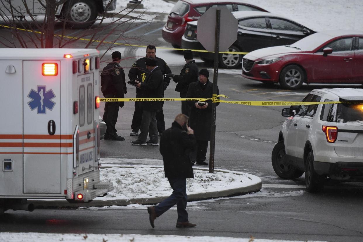 Authorities investigate the scene of a shooting at the Penn State University campus in Beaver County, Pennsylvania: AP