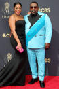 <p>The night's host and his wife brought some fun pops of color to the red carpet. </p>