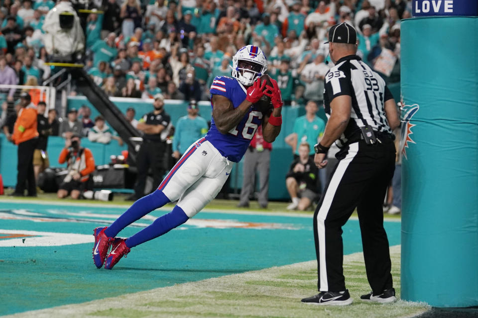 Buffalo Bills wide receiver Trent Sherfield (16) scores a touchdown during the first half of an NFL football game against the Miami Dolphins, Sunday, Jan. 7, 2024, in Miami Gardens, Fla. (AP Photo/Lynne Sladky)