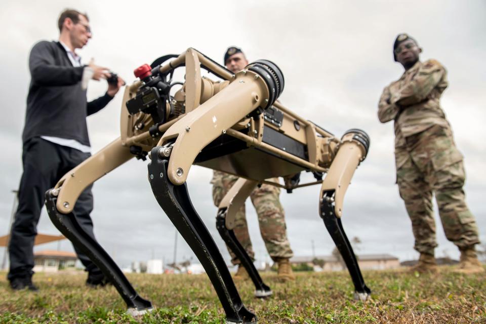Airmen watch a test of an unmanned ground vehicle at Tyndall Air Force Base, Fla., Nov. 10, 2020.