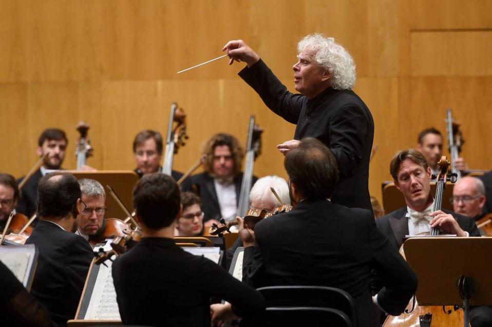 Sir Simon Rattle conducting in 2019.