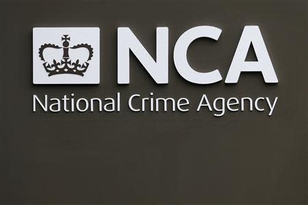 A sign is seen outside the National Crime Agency (NCA) headquarters in London October 7, 2013. REUTERS/Stefan Wermuth