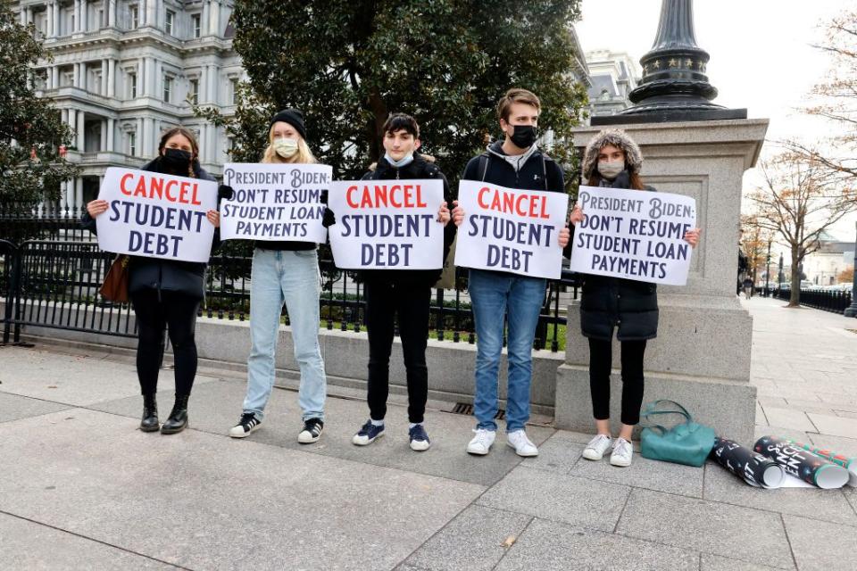 washington, dc   december 15 activists call on president biden to not resume student loan payments in february and to cancel student debt near the white house on december 15, 2021 in washington, dc photo by paul morigigetty images for we, the 45 million