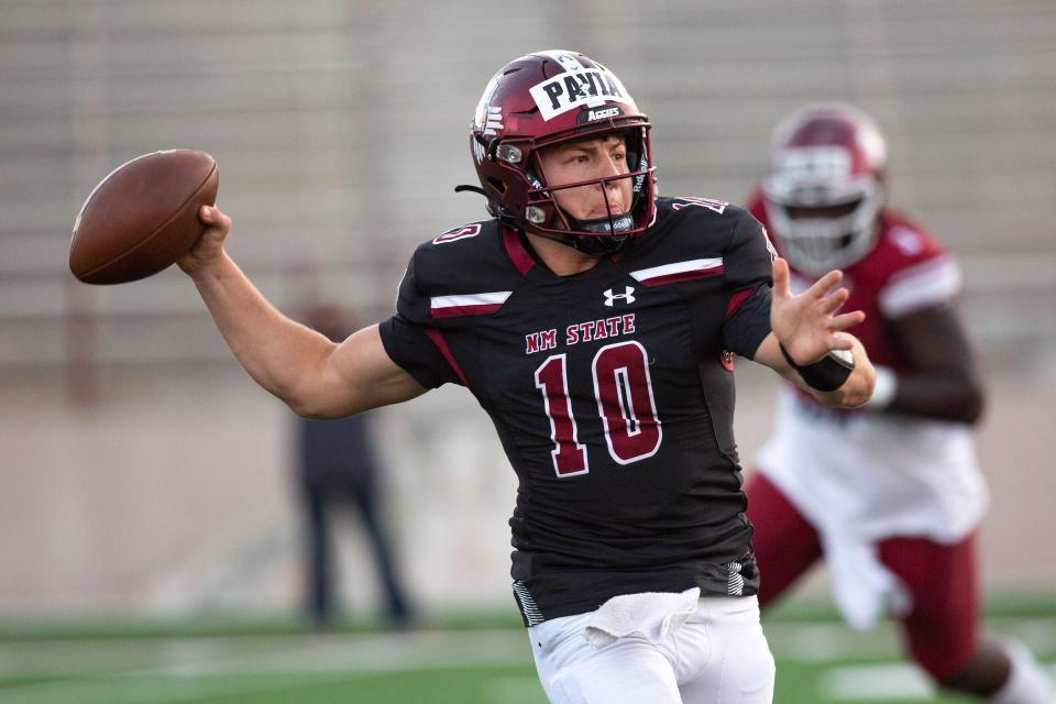 Aggie quarterback Diego Pavia passes thee ball during a New Mexico State spring football game on Thursday, April 20, 2023, at Aggie Memorial Stadium. 