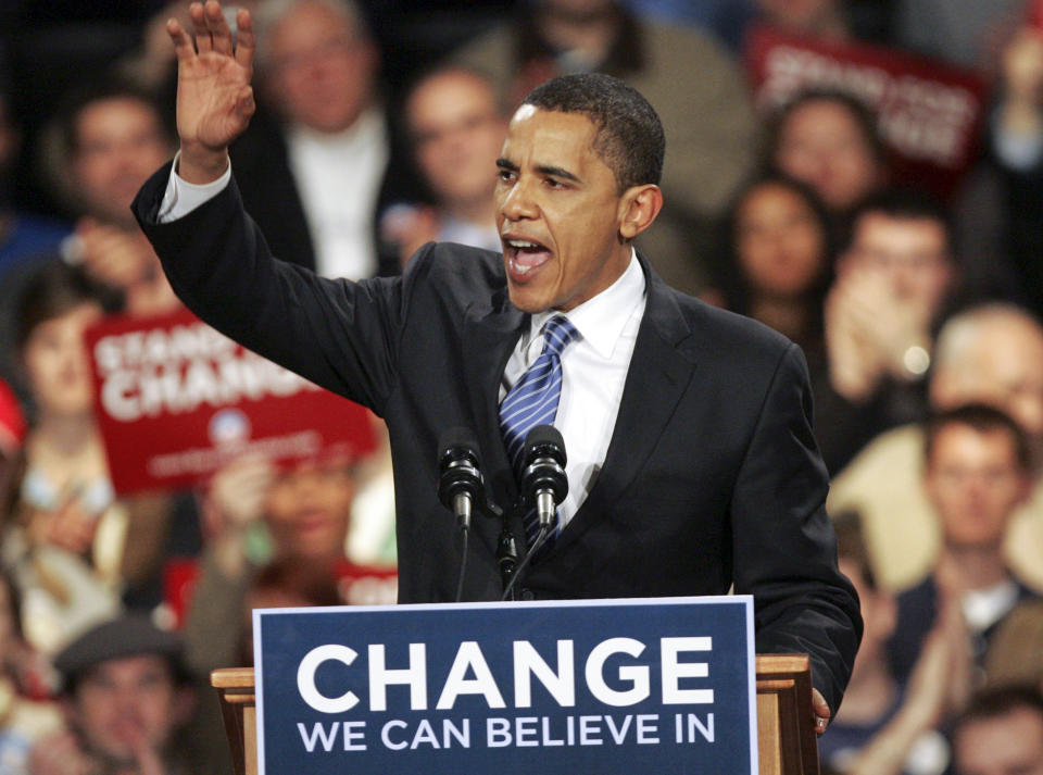 FILE - Democratic presidential hopeful, Sen. Barack Obama D-Ill., celebrates with his supporters after his victory in the Iowa caucus Jan. 3, 2008, in Des Moines, Iowa. (AP Photo/Rick Bowmer, File)