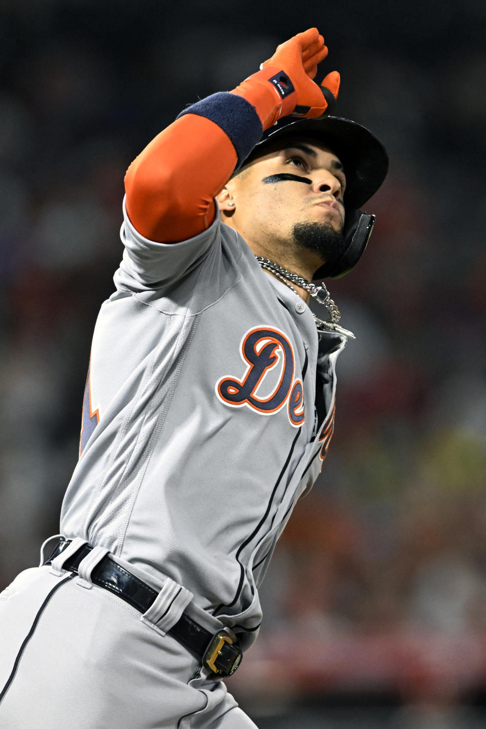 Detroit Tigers' Javier Baez salutes as he passes first base after hitting a solo home run against the Los Angeles Angels during the fourth inning of a baseball game in Anaheim, Calif., Friday, Sept. 15, 2023. (AP Photo/Alex Gallardo)