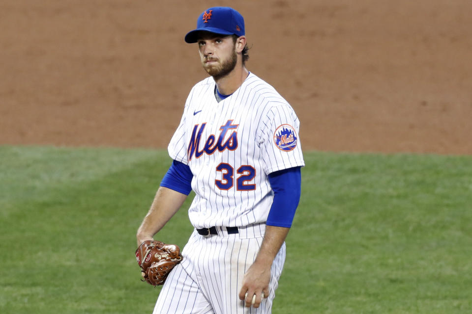 New York Mets starting pitcher Steven Matz reacts after allowing a two-run home run to Washington Nationals' Trea Turner during the third inning of a baseball game Monday, Aug. 10, 2020, in New York. (AP Photo/Kathy Willens)