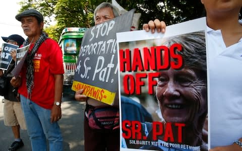 Supporters rally at the Bureau of Immigration - Credit: Bullit Marquez/AP