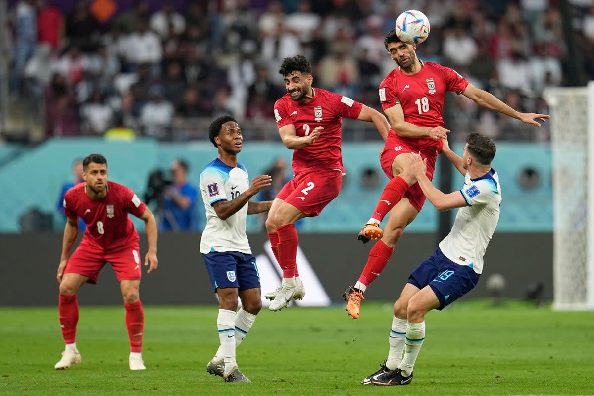 Iran suffered a 6-2 defeat to England in their World Cup opener and are now seeking to bounce back against Wales (Abbie Parr/AP) (AP)