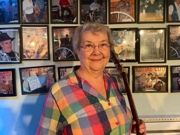 Jeannie Arsenault is the host of The Wheel Club's Hillbilly Night on Mondays, which took place in front of an in-person audience for the first time since the beginning of the pandemic on Monday. (Rowan Kennedy/CBC - image credit)