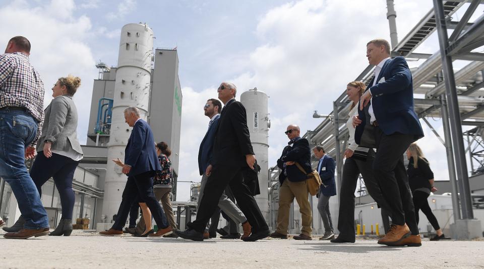 Visitors look around a renewable gas storage facility during a tour Friday at the Verbio plant in Nevada, the first industrial-scale renewable natural gas facility in North America using agricultural residue as its feedstock.