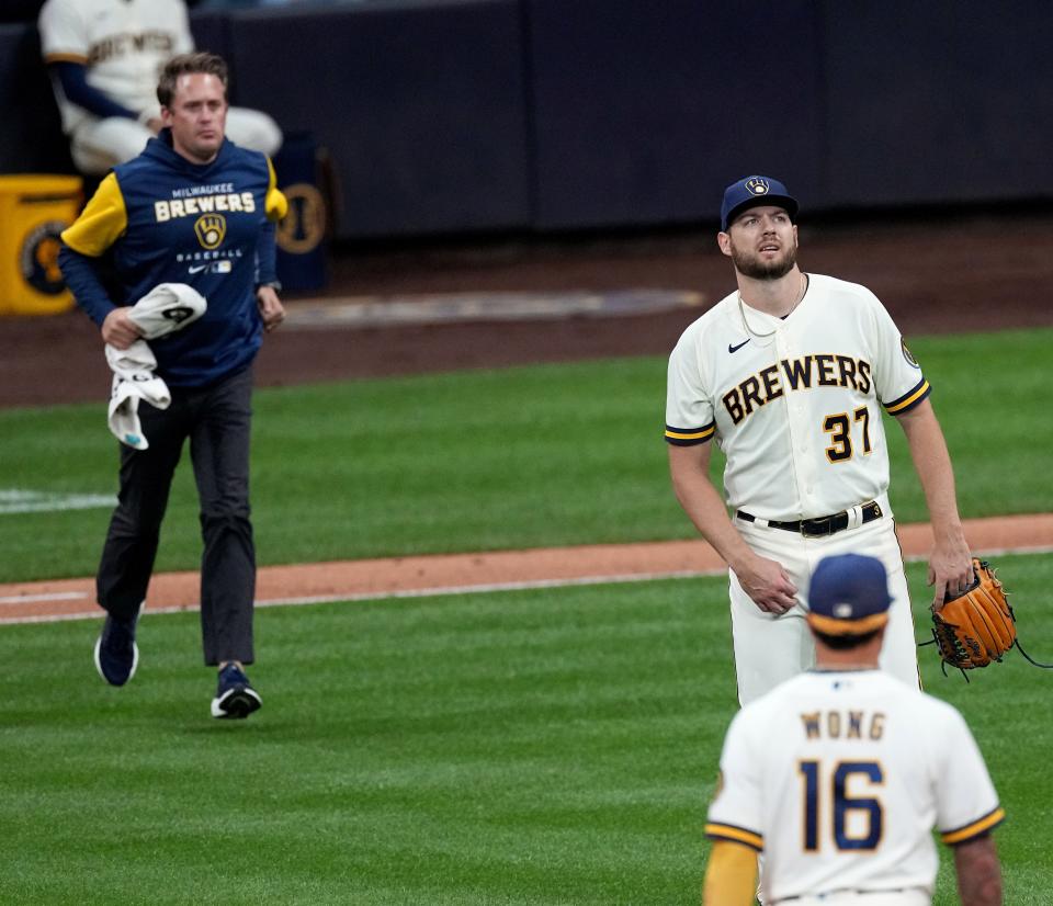 Milwaukee Brewers starting pitcher Adrian Houser (37) leaves the game with an injury during the fourth inning of their game against the St. Louis Cardinals Tuesday, September 27, 2022 at American Family Field in Milwaukee, Wis.