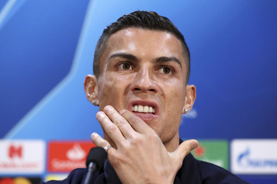 Juventus' Cristiano Ronaldo attends a press conference at Old Trafford, Manchester, England, Monday, Oct. 22, 2018. Juventus will play a Champions League soccer match against Manchester United on Tuesday. (Martin Rickett/PA via AP)