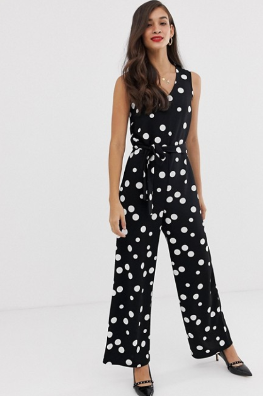 A photo of a model wearing the Y.A.S Natal polka dot print jumpsuit from ASOS.