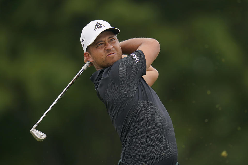 Xander Schauffele hits from the seventh tee during the final round of the BMW Championship golf tournament at Wilmington Country Club, Sunday, Aug. 21, 2022, in Wilmington, Del. (AP Photo/Julio Cortez)