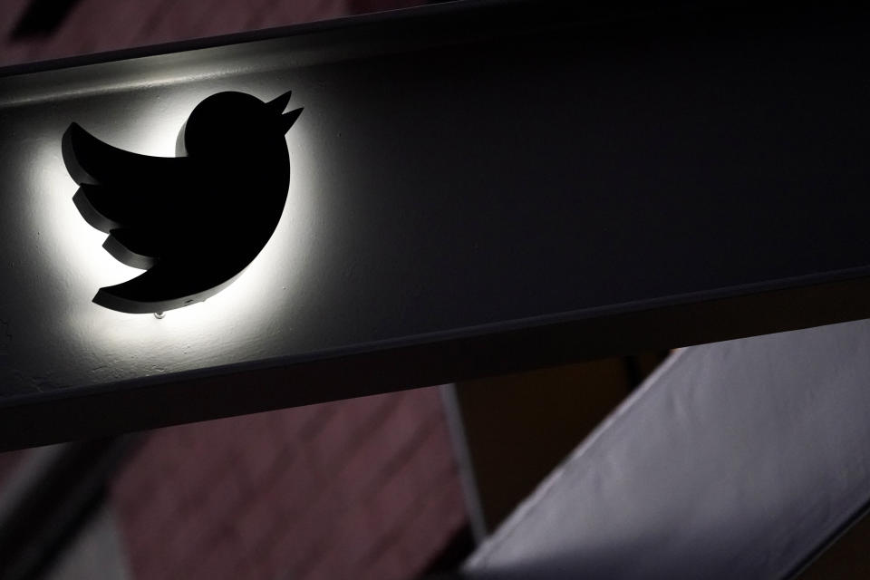 The Twitter logo is seen on the awning of the building that houses the Twitter office in New York, Wednesday, Oct. 26, 2022. Elon Musk posted a video Wednesday showing him strolling into Twitter headquarters ahead of a Friday deadline to close his $44 billion deal to buy the company. (AP Photo/Mary Altaffer)