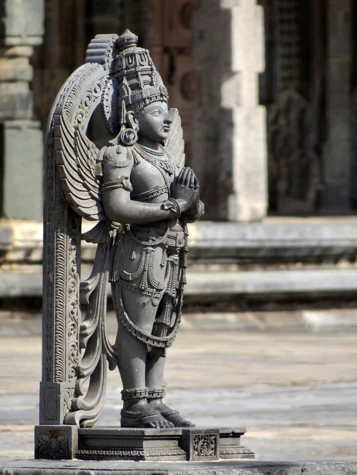 Lord Garuda, the sacred steed of Vishnu, greets devotees at the portals of the temple.