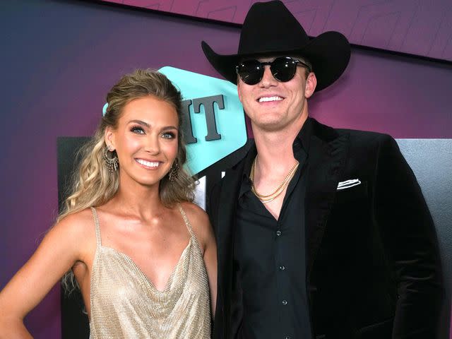 <p>Kevin Mazur/Getty</p> Hallie Ray Light McCollum and Parker McCollum attend the 2023 CMT Music Awards on April 2, 2023 in Austin, Texas
