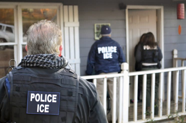 ICE agents at a home in Atlanta, during a targeted enforcement operation aimed at immigration fugitives, re-entrants and at-large criminal aliens. (Photo: Bryan Cox/ICE via AP)