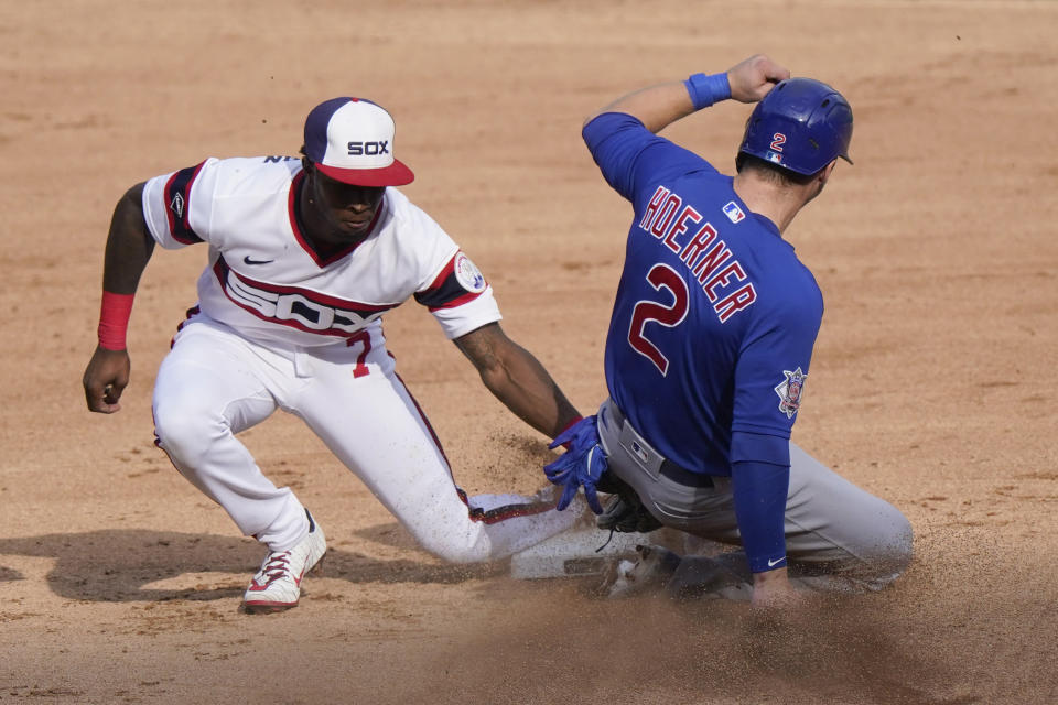 Chicago White Sox shortstop Tim Anderson, left, tags out Chicago Cubs' Nico Hoerner at second during the sixth inning of a baseball game in Chicago, Sunday, Sept. 27, 2020. Nico Hoerner caught stealing second base. (AP Photo/Nam Y. Huh)