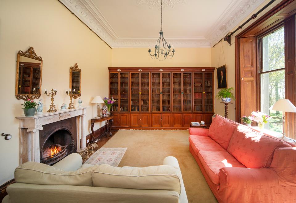 Original features like Italian marble fireplaces can be seen throughout the house (Knight Frank)