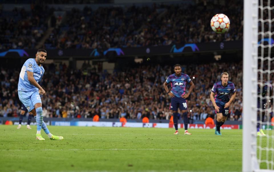 Riyad Mahrez of Man City scores their 3rd goal from the penalty spot during the UEFA Champions League group A match between Manchester City and RB Leipzig at Etihad Stadium on September 15, 2021 in Manchester, United Kingdom - Charlotte Wilson/Offside/Offside via Getty Images