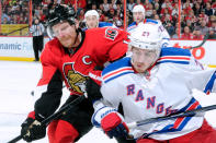 OTTAWA, CANADA - APRIL 23: Daniel Alfredsson #11 of the Ottawa Senators chases the puck in the corner in Game Six of the Eastern Conference Quarterfinals against the New York Rangers during the 2012 NHL Stanley Cup Playoffs at the Scotiabank Place on April 23, 2012 in Ottawa, Ontario, Canada. (Photo by Richard Wolowicz/Getty Images)