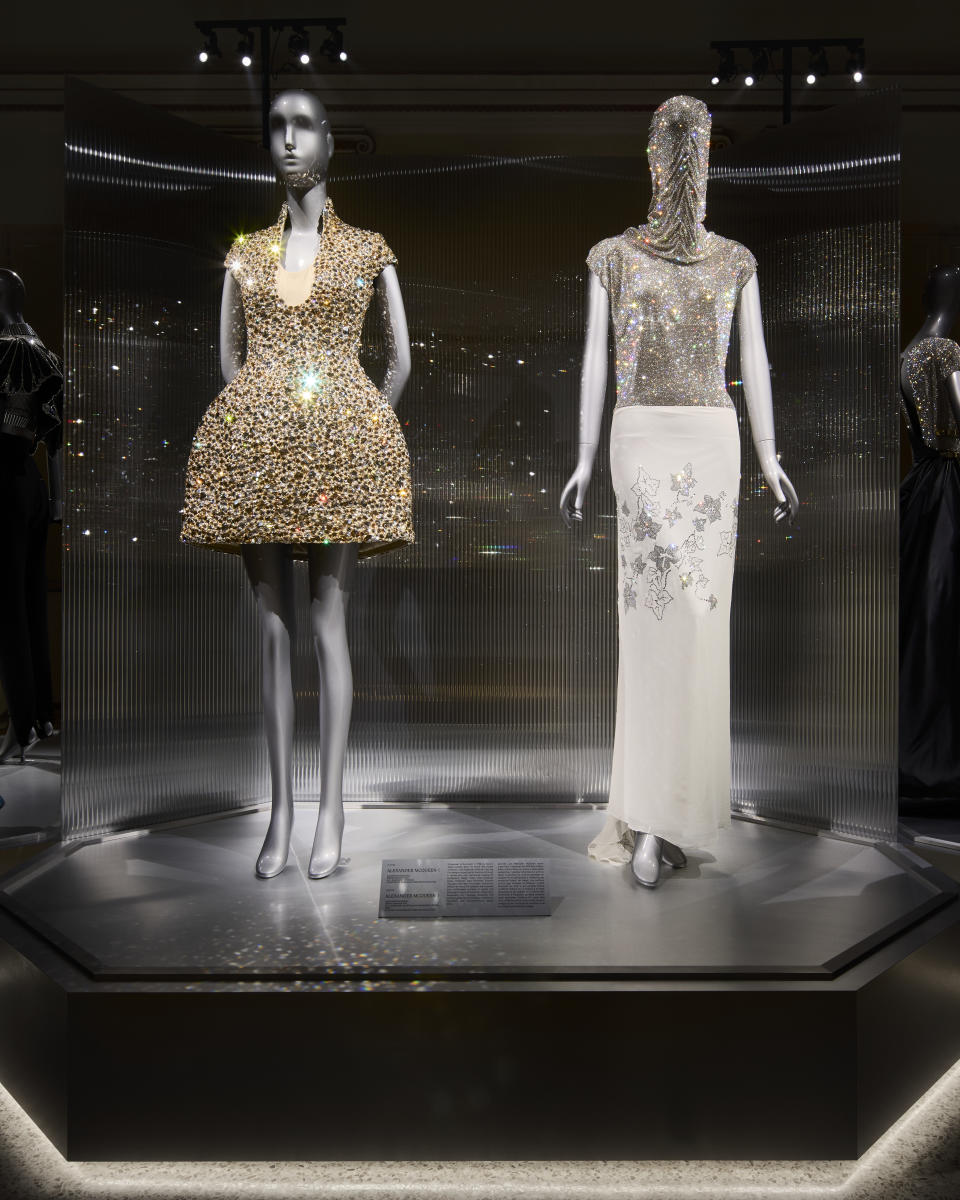 Alexander McQueen looks at the exhibition.