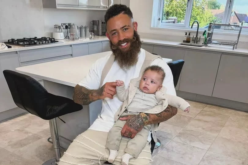 Ashley Cain with his baby son Aliyas