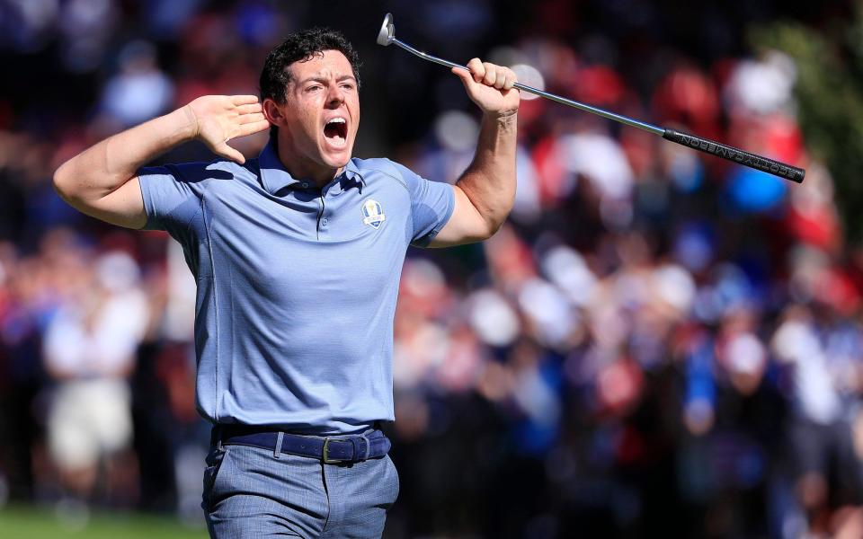 Rory McIlroy celebrates against Patrick Reed in the 2016 Ryder Cup singles - EPA/TANNEN MAURY