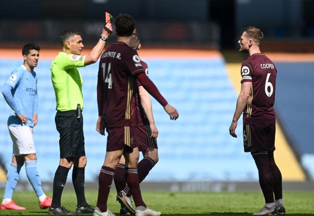 Liam Cooper (right) was sent off for a challenge on Gabriel Jesus 