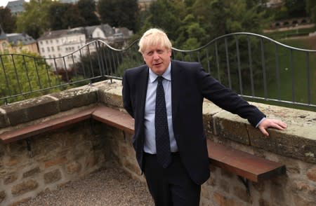 Britain's Prime Minister Boris Johnson poses for a photograph prior to giving a statement to television after a meeting with Luxembourg's Prime Minister Xavier Bettel, in Luxembourg