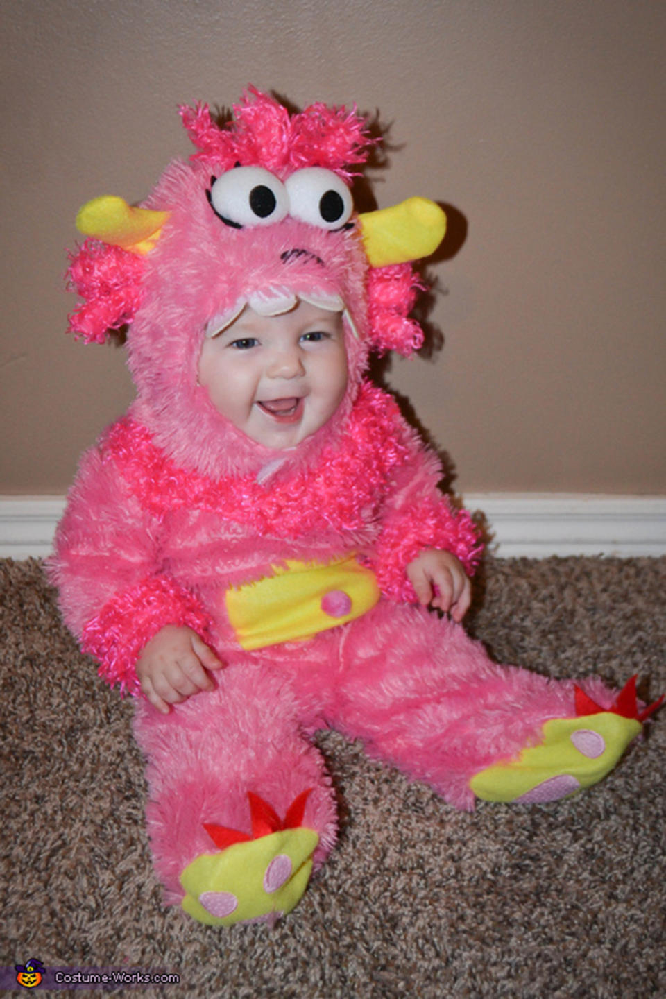<a href="http://www.costume-works.com/costumes_for_babies/pink_little_monster.html" target="_blank">via Costume Works </a>